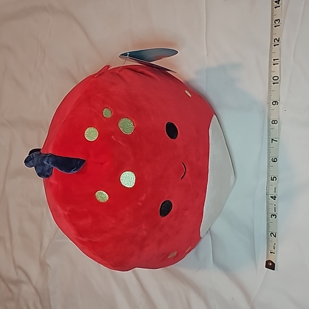 Squishmallow Dolan the red dinosaur.  NWT.